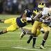 Michigan defensive back Delonte Hollowell tackles Notre Dame wide receiver Chris Brown during the second half at Michigan Stadium on Saturday, September 7, 2013. Melanie Maxwell | AnnArbor.com